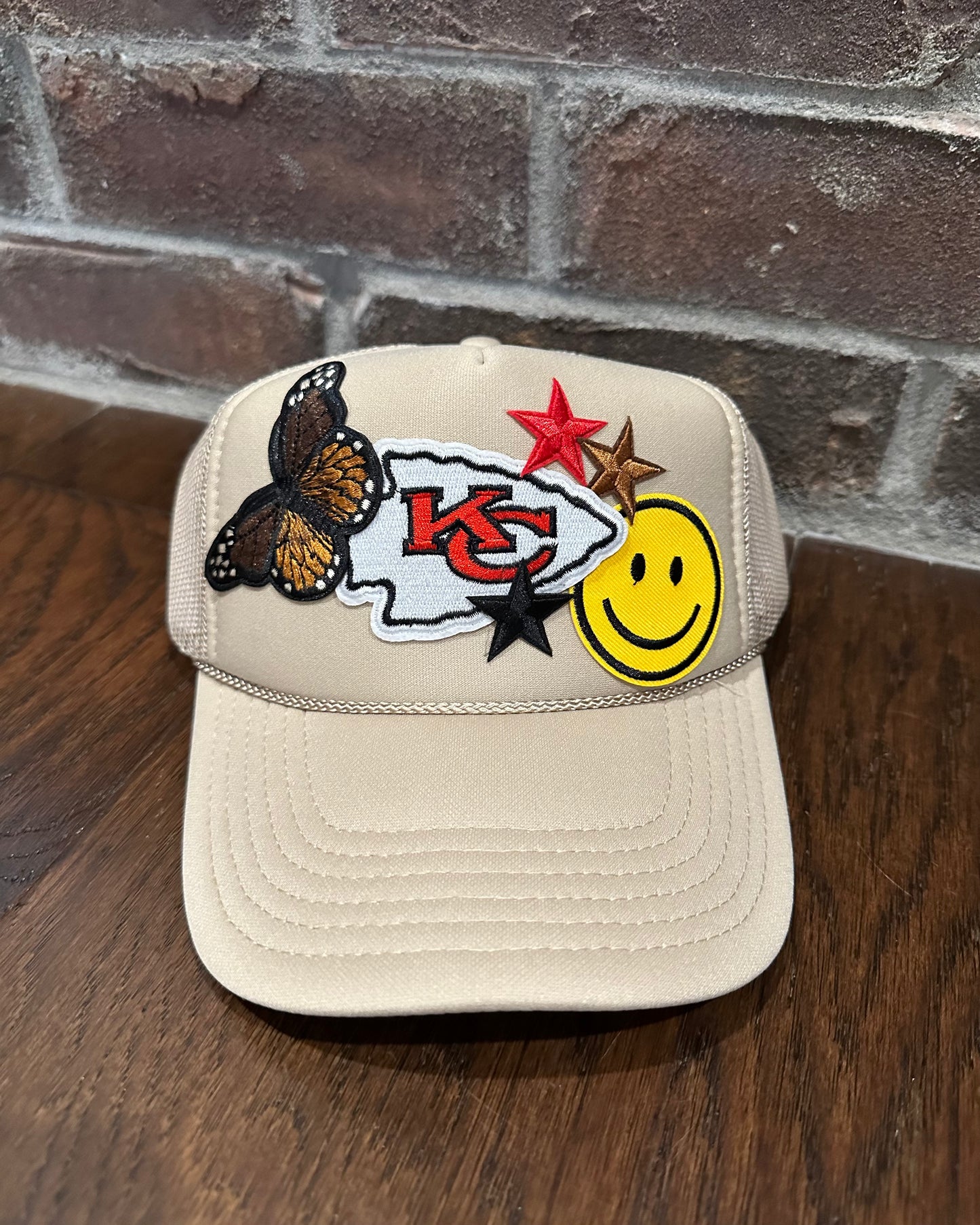 Smiley Arrowhead Trucker